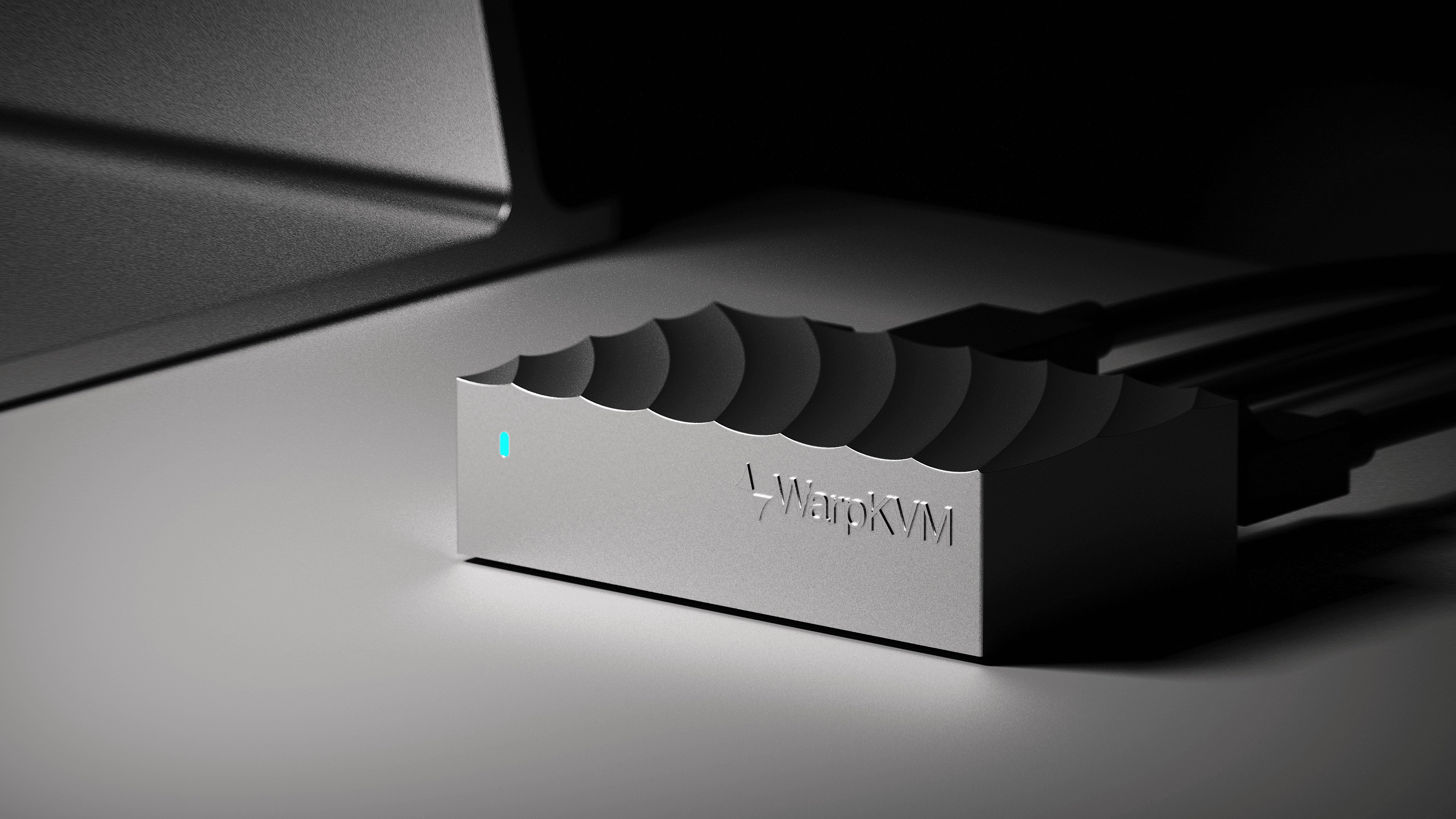 WarpKVM 01 machined aluminum enclosure with warped top surface, status LED glowing warp blue